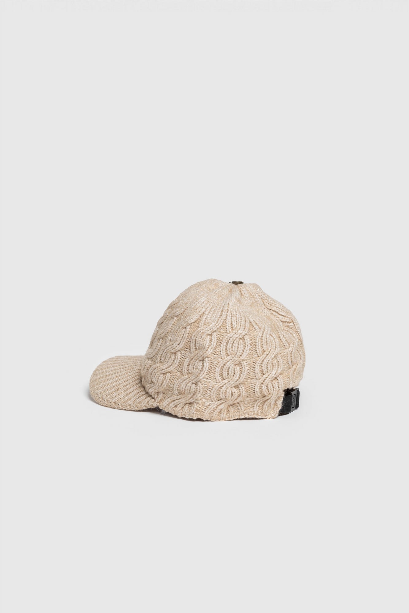 Gorra trenzado Ochos pompon beige